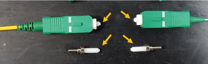 je viens de m'apercevoir que mon câble fibre (à embout vert) est